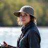 Portrait of Sarah Jones, a satisfied Moorhen Lures customer, holding a fishing rod